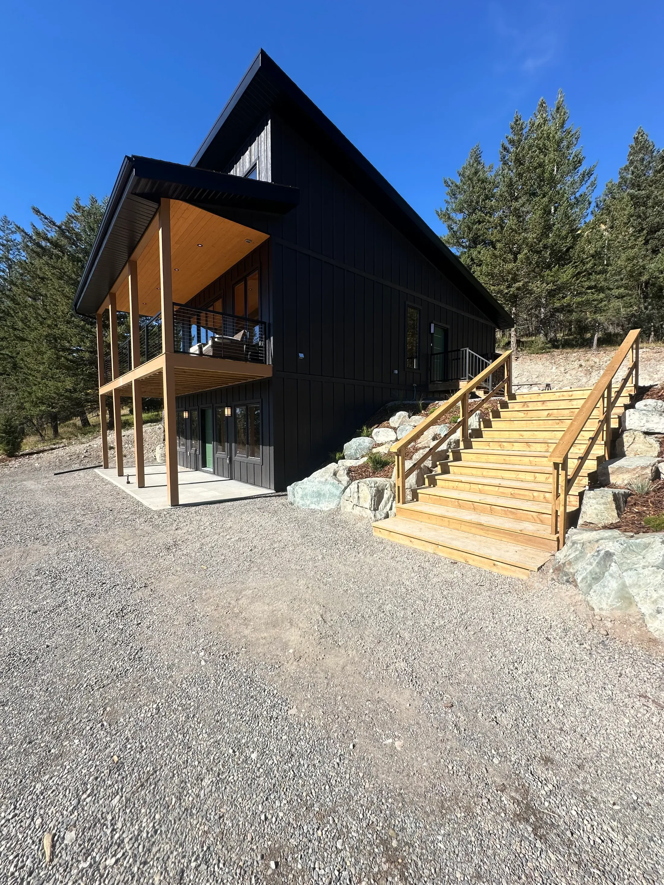 A finished BK build on its hillside lot